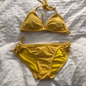 An itsy bitsy teeny weeny yellow polka dot bikini